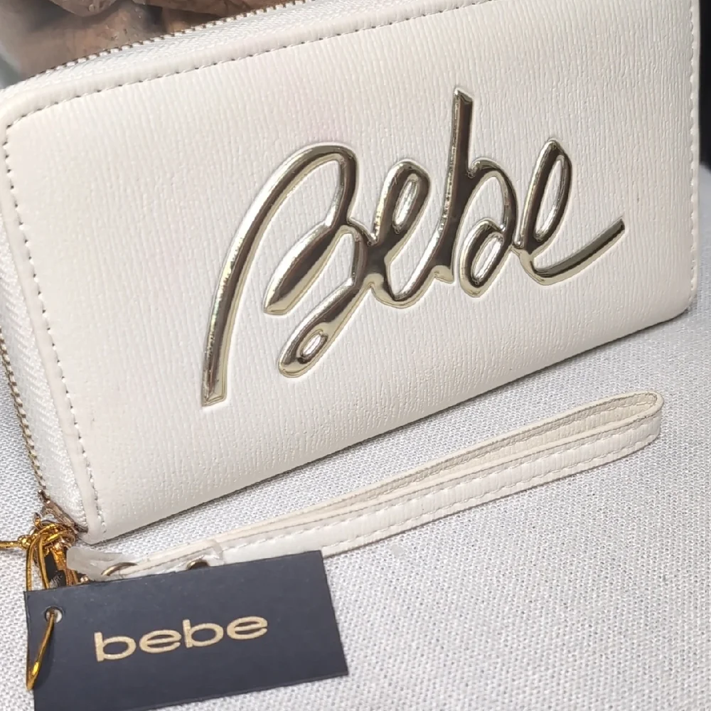 bebe White Zip Wristlet Clutch with Gold Logo